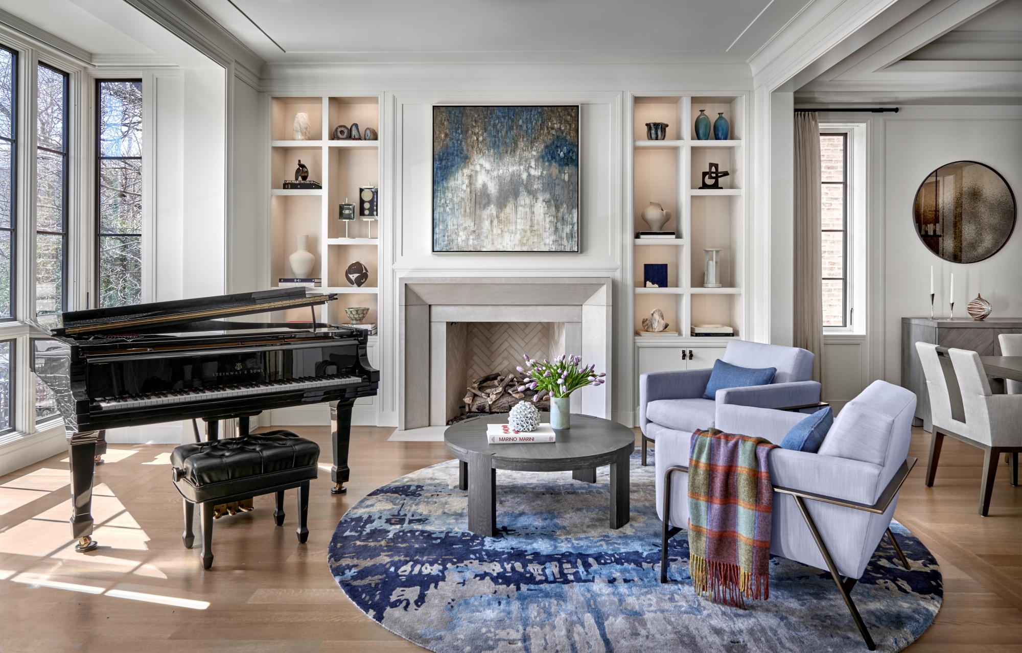 Interior living area with fireplace and baby grand piano