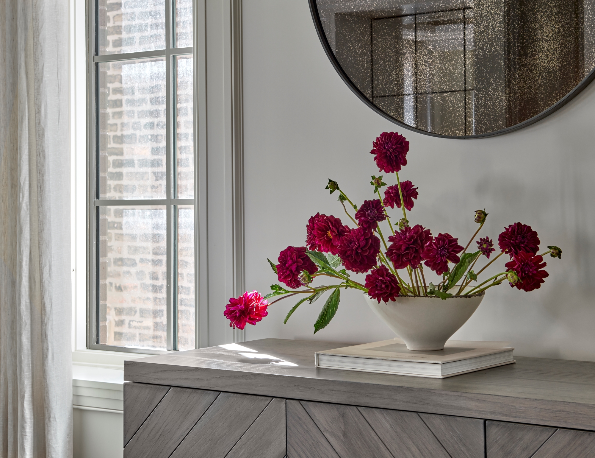 Detail of window and flowers in a bowl